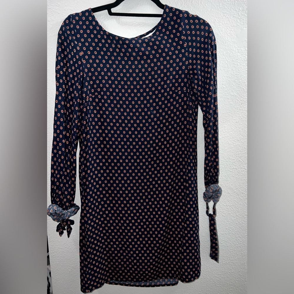 Navy blue dress with red accents